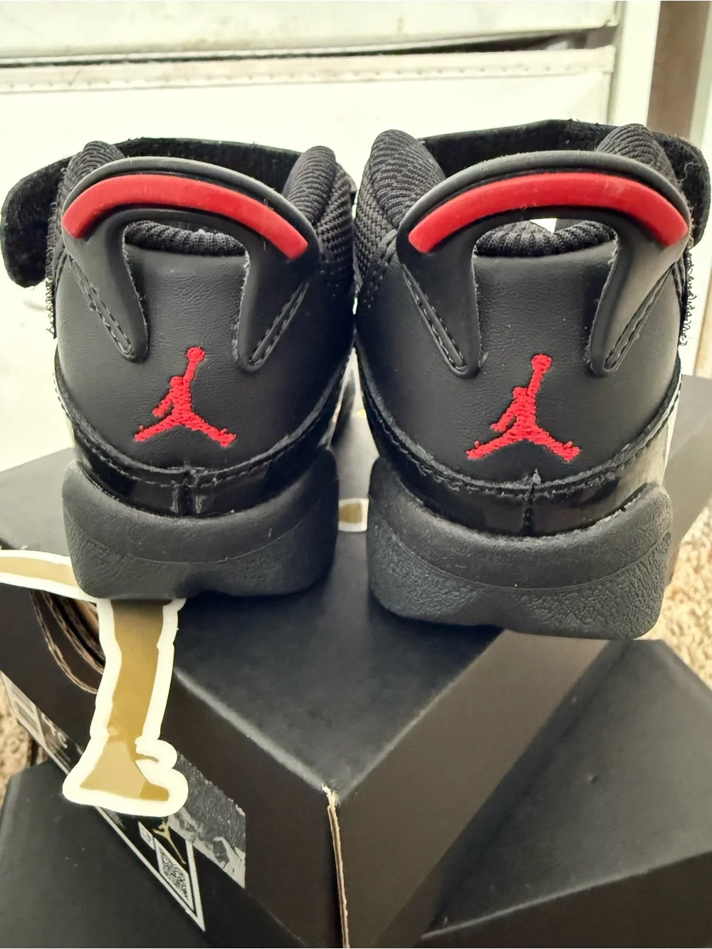 Jordan Kids' Black Patent High-Top Sneakers with Red Accent